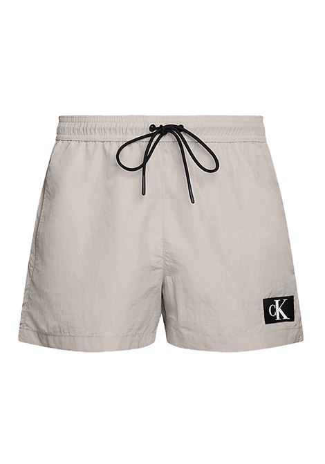 Costume Calvin Klein Logo Patch Short Drawstring Sabbia Uomo CALVIN KLEIN SWIMWEAR | Costumi | KM0KM00979-PE0